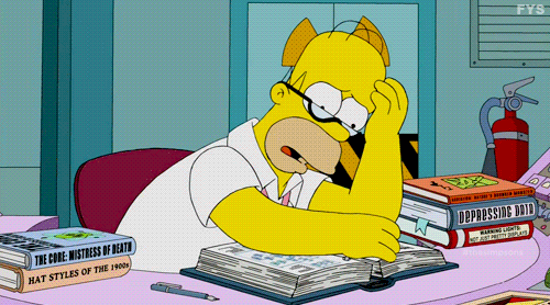 Homer-Simpson-Flipping-Through-Book-The-Simpsons.gif